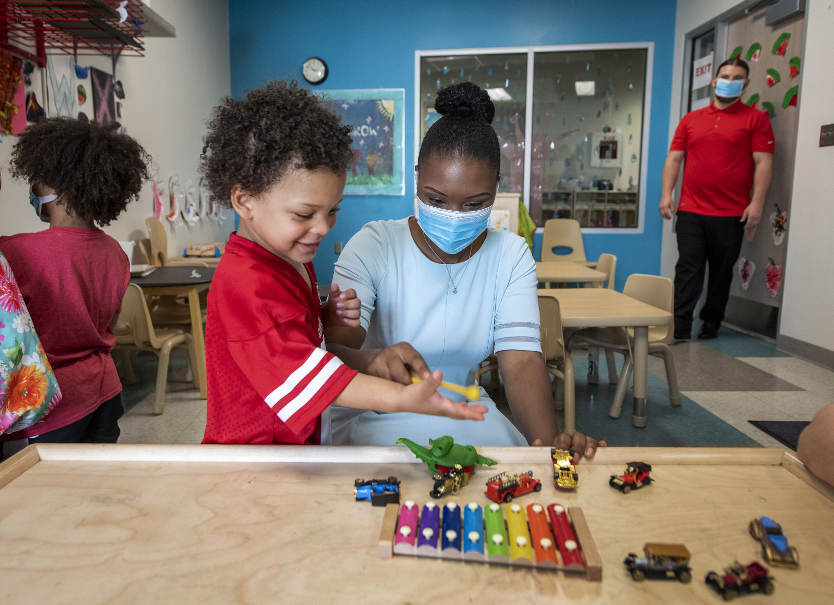 Tiana Williams and Carter play at Head Start